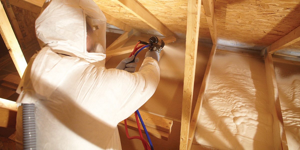 Spray foam insulation applied to attic rafters